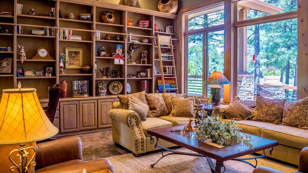 interior with shelves packed with and wall sized window and warm toned lighting